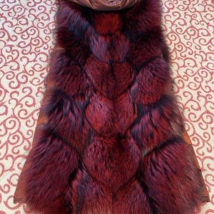 Dyed fox fur reversible vest with hood from Lord & Taylor Fur Salon.